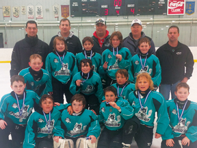 The 2004 Portage Junior Terriers picked up silver at an extended season hockey tournament in Morris April 6. (Submitted photo)