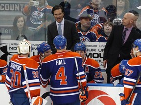 Dallas Eakins, seen here behind the bench during a game against the Ducks March 28, says he assured Anaheim coach Bruce Boudreau he didn't send players out to pick fights on Sunday. (Ian Kucerak, Edmonton Sun)