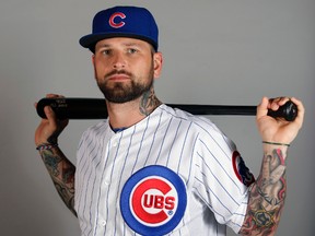 Chicago Cubs infielder Ryan Roberts (4) poses for a photo at Cubs Spring Training complex on Feb 24, 2014 in Mesa, AZ, USA. (Rick Scuteri/USA TODAY Sports)