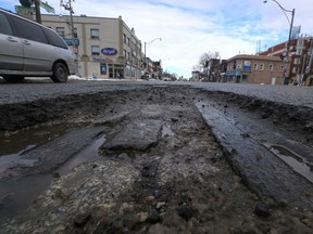 A pothole on Yonge St., north of Lawrence Ave. — at Melrose Ave. — in January. (MICHAEL PEAKE, Toronto Sun)