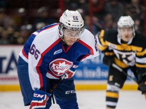Josh Ho-Sang #66 of the Windsor Spitfires prepares for a faceoff against the Kingston Frontenacs on January 30, 2014 at the WFCU Centre in Windsor, Ontario, Canada.   (Dennis Pajot/Getty Images/AFP)