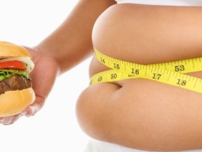 Obese people get full faster, but still eat more says a new study (Fotolia)