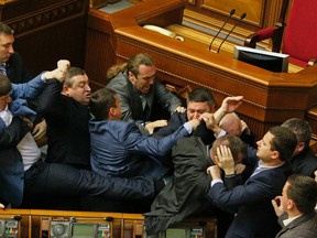 Deputies clash during a session of the parliament in Kiev, April 8, 2014. (REUTERS/Valentyn Ogirenko)
