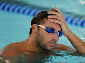 In this file photo taken on February 3, 2011, five-time Australian Olympic freestyle swimming champion Ian Thorpe takes a break during a training session in Sydney. (AFP)