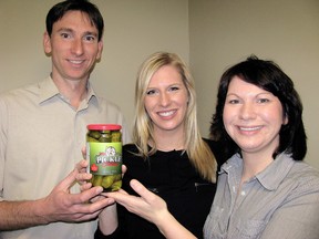 Thames Van Farms have launched a new brand, The Pickle Station, and are also participants in a new program that seeks to promote Chatham-Kent's agricultural products. From left is Jeff VanRoboys, Krystle VanRoboys and Kelly Deline. (PETER EPP/CHATHAM THIS WEEK/QMI AGENCY)