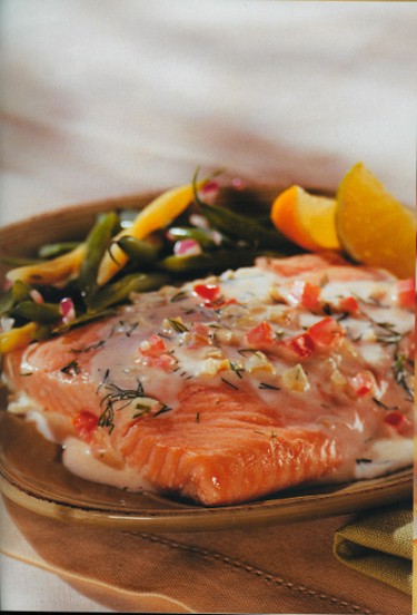 SALMON WITH CREAMY TOMATO DILL SAUCE Don’t have time to cook? Microwave this salmon dish for a quick Friday night dinner. (QMI Agency archives)
