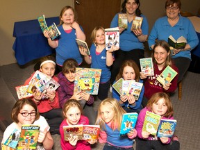 Some members of Bayfield Guiding display age appropriate reading material that has been donated to their "Just Books Sale" to be held at the Bayfield Village Inn on Sat., Apr. 12 and Sun, April 13. The sale will be held on Saturday from 10 a.m. to 4 p.m. and Sunday noon to 4 p.m. Bayfield Guiding will be using their portion of the funds to attend Rally Day 2014 at Canada’s Wonderland. Camp Klahanie will also share in a portion of the funds raised. The Bayfield Village Inn is located at 34777 Bayfield River Road, on the corner of Hwy. 21. (CONTRIBUTED PHOTO)