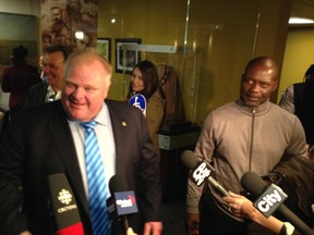 Mayor Rob Ford announces disgraced Olympic sprinter Ben Johnson, right, will be helping his re-election campaign. (DON PEAT/Toronto Sun)