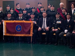 The Vermilion Cadets pose with their newly acquired flag from the Princess Patricia Canadian Light Infantry.