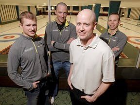 Carter Rycroft, Nolan Thiessen, Kevin Koe and Pat Simmons mug for a photo in 2012. (LYLE ASPINALL/QMI AGENCY)