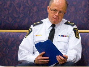 Police Chief Brad Duncan listens to remarks from Mayor Joe Fontana during a meeting of council?s corporate services committee Tuesday. Fontanta ripped up a copy of a police request for more money. (CRAIG GLOVER, The London Free Press)