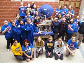 Members of the Renaissance Robotics Club at St. Joseph's Catholic High School point to their Rambot 2.0 robot which took them to the semifinals in competition against 40 other schools on the weekend in Windsor.  (Eric Bunnell, Times-Journal)
