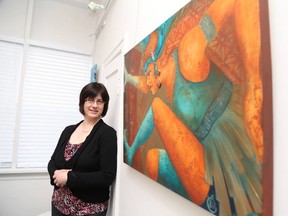 Gino Donato/The Sudbury Star
Artist Julie Courtemanche shows off some of her work at Artists on Elgin. The Divine Feminine by Courtemanche runs until the end of April. Gallery hours are Monday to Saturday, 10 a.m. to 5 p.m.