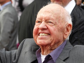 Academy Award winning actor Mickey Rooney, 91, arrives at the world premiere of the 40th anniversary restoration of the film "Cabaret" during the opening night gala of the 2012 TCM Classic Film Festival in Hollywood, California April 12, 2012.  REUTERS/Fred Prouser