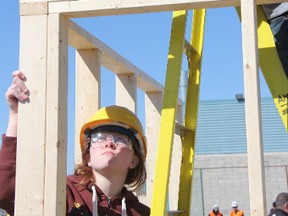 Alexander Mackenzie students Tatiauna Van Dyk and Zack Ayrheart work together to frame a shed at Lambton College Wednesday. The pair were part of a four-member school team donning their hard hats for the public school board's first regional skilled trades competition. BARBARA SIMPSON/THE OBSERVER/QMI AGENCY