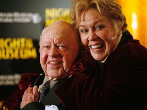 Actor Mickey Rooney (L) and his wife Janice arrive at the American Museum of Natural History for the premiere of the movie "Night at the Museum" in New York in this file photo taken December 17, 2006. (REUTERS/Eric Thayer/Files)