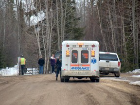 Concerned neigbours wait for news as emergency crews arrive to battle a mobile home fire 25 kilometres south of Whitecourt. A neighbour was taken to hospital but nobody sustained serious injuries. Nobody was home at the time of the fire. Bryan Passifiume photo | Whitecourt Star