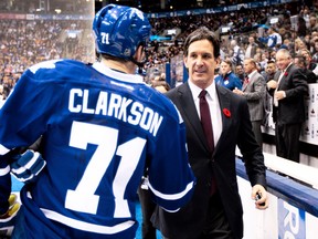 Brendan Shanahan greets Maple Leafs' forward David Clarkson before a a game in November. Shanahan is being wooed by the Leafs to join upper management, a move that would cast doubt over the future of GM Dave Nonis. (Dave Abel/Toronto Sun file)