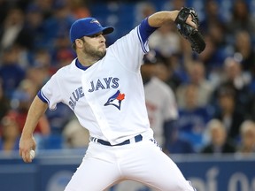 Brandon Morrow of the Toronto Blue Jays delivers a pitch in the first inning during MLB game action against the Houston Astros on April 9, 2014 at Rogers Centre. (Tom Szczerbowski/Getty Images/AFP)