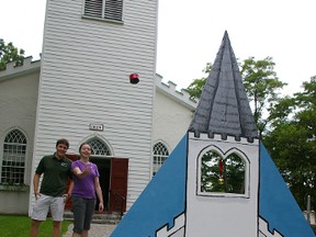 Christopher Shackleton and Michelle Olivier try out toss game for 2013 Family Fun Day at Old St. Thomas's Church, 55 Walnut St. where the two university students were summer tour guides. The church and the Old St. Thomas Church Trust are among recipients of 2014 heritage conservation awards from the St. Thomas-Elgin branch of the Architectural Conservancy of Ontario. Eric Bunnell/Times-Journal