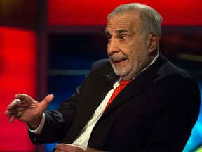 Billionaire activist-investor Carl Icahn gives an interview on FOX Business Network's Neil Cavuto show in New York February 11, 2014. REUTERS/Brendan McDermid