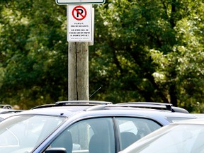 TPA hopes to start trying cellphone payment for parking in Green P parking lots by mid-2014 "with implementation at on-street parking machine locations to follow as soon thereafter as possible." (Toronto Sun files)