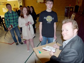 Postmedia Network
Author Scott Chantler signs copies of his graphic novel Two Generals in this file photo.