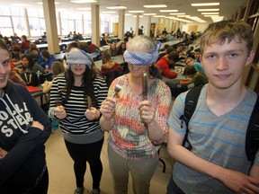 Glendale’s Student Council (represented in this photo by Prime Minister Hannah Hopper, left and Charity Minister Jack McCormick, right) is hosting ‘Dinner In The Dark’ (patrons will be blindfolded, as illustrated by ‘models’ Victoria DeMelo, centre, left; and Line Desnoyers-Rabb, centre, right) Wednesday, April 16, a quarter-chicken dinner/live auction fundraiser in support of The Foundation Fighting Blindness. Tickets are $12 for adults, $10 for students and available up to Friday at Tillsonburg’s Station Arts Centre (519-842-5161). Those unable to procure tickets but wishing to support the event are welcome to participate in the auction, which is scheduled to being around 6:30 p.m.  Jeff Tribe/Tillsonburg News