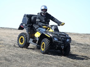 Dave Amey, spokesman for the Mid-Canada Power Sport Show, rips it up on a Can Am 800 all-terrain vehicle on a demo course. The show opens Friday at Red River Exhibition Park. (Kevin King/Winnipeg Sun)