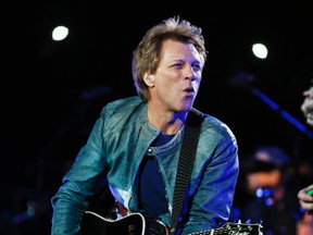 Jon Bon Jovi will front a Toronto ownership group intent on purchasing and relocating the Buffalo Bills. (STAN BEHAL/QMI Agency)