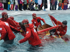 The ski patrol's vessel for the cardboard canoe race wasn't exactly sea worthy. John Stoesser photo/QMI Agency