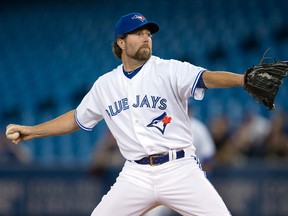 Toronto Blue Jays starting pitcher R.A. Dickey throws a pitch during the first inning in a game against the Houston Astros at Rogers Centre. (Nick Turchiaro/USA TODAY Sports)