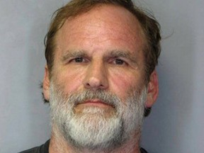 Dr. Melvin Morse, 58, is seen in this booking photo released by the Delaware State Police August 9, 2012. (REUTERS/Delaware State Police/Handout)