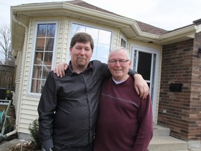Michael Judson, left, was recently reunited with his father Charles after 40 years. Judson, who lives in England, was visiting his father in Sarnia, Ont. on Tuesday April 8, 2014. (TYLER KULA/ THE OBSERVER/ QMI AGENCY)