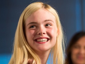 Actress Elle Fanning arrives at the Marie Claire's Fresh Faces Party at Soho House on April 8, 2014 in West Hollywood, California.  Valerie Macon/Getty Images/AFP