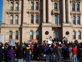 Protesters gathered in front of the of the Jefferson County Courthouse in Steubenville, Ohio in this January 5, 2013 file photo. (REUTERS/Drew Singer/Files)