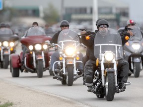 Riders leave the Assiniboia Downs during the Ride For Dad charity motorcycle ride, Saturday, May 25, 2013. (SUN FILE)