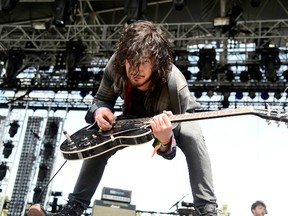 Jordan Cook of Reignwolf performs onstage during day 2 of the 2013 Coachella. AFP photo