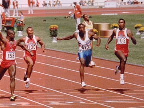 Canadian Ben Johnson, left, crossing the finish line first in the men’s 100-metre final at the Seoul Olympics in 1988. That’s American Carl Lewis on the right, who finished second, and was later awarded the gold medal after Johnson tested postive for steroid use.
STAN BEHAL/TORONTO SUN FILES
