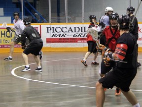 Prospective members of the Sarnia Krown Beavers senior "B" lacrosse team run through offensive and defensive sets during training camp on Saturday, April 12. The team, entering its' 3rd year in the Ontario Lacrosse Association, is looking to improve on their 6-10 record last year. SHAUN BISSON/THE OBSERVER/QMI AGENCY