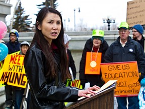 Dr. Nhung Tran-Davies leads a rally to support a petition calling for math curriculum reform at the Alberta Legislature Building in Edmonton, Alta., on Saturday, April 12, 2014. Codie McLachlan/Edmonton Sun/QMI Agency