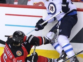 Blake Wheeler (right) led the Jets with career highs in goals (28) and points (69).