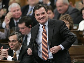 Jim Flaherty stands to speak as finance minister in the House of Commons on Parliament Hill in Ottawa Feb. 20, 2007. (REUTERS/Chris Wattie)
