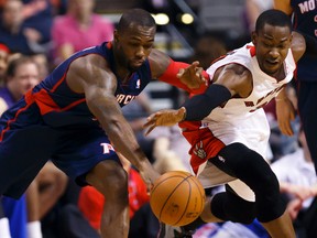 Raptors forward Terrence Ross (right) steals the ball from Pistons guard Rodney Stuckey on Sunday afternoon in Detroit. (Rick Osentoski/USA TODAY Sports)