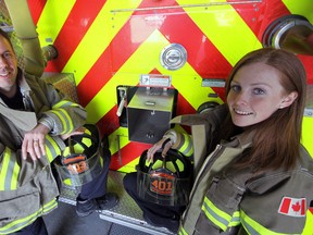 Jeff Tribe/Tillsonburg News
SWOX firefighters Jason Nigh (left) of Ingersoll and Brittany Russell (right) of Brownsville recently completed Hamilton’s Around The Bay 5K fundraising race in full bunker gear, on oxygen in under 37 minutes. To date, their unique efforts have raised over $1,600 for the Canadian Cancer Society.