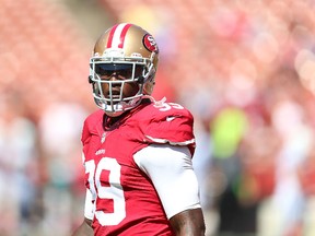 Aldon Smith #99 of the San Francisco 49ers looks on during warm-ups against the Indianapolis Colts at Candlestick Park on September 22, 2013 in San Francisco, California. (Jed Jacobsohn/Getty Images/AFP)