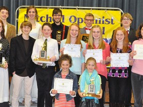 Winners of major awards at the Mitchell Optimist Music Festival, presented last Friday, April 11, were (back row, left): Shayne Simpson, Emily Van Mierlo, Jacob Vorstenbosch, Connor Delaney, Theo Bulani. Middle row (left): Larisa Shea, Sean Dolan, Alec Murray, Mary Kolkman, Sarah Kolkman, Kathryn Kolkman, Elysha Vorstenbosch. Front (left): Kyrie Bergsma, Katherine Havenga