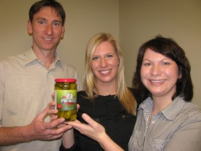 Thames Van Farms have launched a new brand, The Pickle Station, and are also participants in a new program that seeks to promote Chatham-Kent's agricultural products. From left is Jeff VanRoboys, Krystle VanRoboys and Kelly Deline.