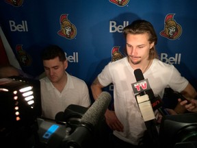 Erik Karlsson speaks with the media about the Ottawa Senators lost season as the team's players gathered to clean out their lockers Monday, April 14, 2014. (DARREN BROWN Ottawa Sun)