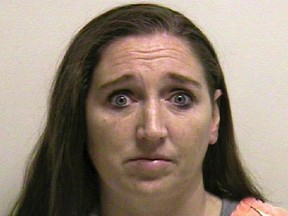 Megan Huntsman is shown in this booking photo provided by the Pleasant Grove County Jail in Pleasant Grove, Utah April 13, 2014. (REUTERS/Pleasant Grove County Jail/Handout via Reuters)